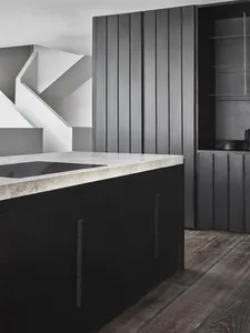 Modern kitchen interior designed with concrete cabinets, highlighting sleek, minimalist, and contemporary features.
