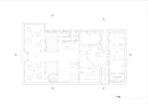 Floor plan of a coffee shop with tables, chairs, and a central open area.