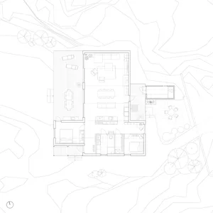 A modern residential floor plan featuring a mix of wood, concrete, and glass materials.