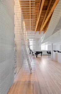 A modern interior design featuring metallic and wooden materials.