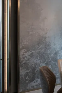 A detailed view of a fabric living room wallpaper featuring ornate designs.