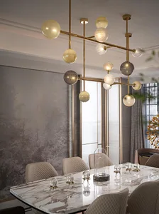Modern marble dining room with contemporary lighting fixture and plush chairs.