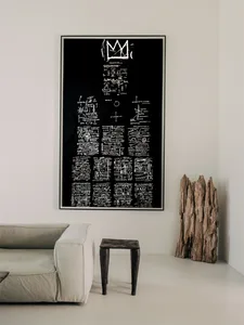 A black and white painting featuring a cityscape with various text and symbols on a white background.