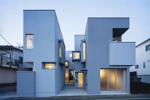 Modern residential home with grey concrete exterior