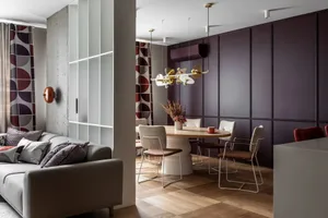 Modern living and dining room combination with mixed materials.