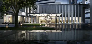 Modern public interior space featuring glass, concrete, and metal materials.