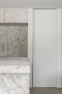 Modern interior design featuring marble finishes and clean lines