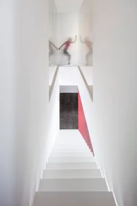A modern interior featuring glass elements.