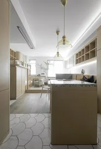 Modern kitchen with a combination of marble, terrazzo, and wood finishes.
