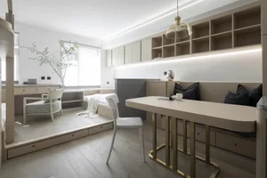 A modern residential space featuring wood furniture and materials.
