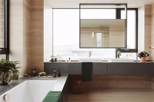 A minimalist bathroom featuring modern design elements, sandstone tiles, and wooden accents.