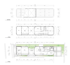 Floor plan drawing of a house showing dimensions and layout in a detailed architectural blueprint.