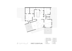 Floor plan of a residential building's first floor with labeled rooms and features.