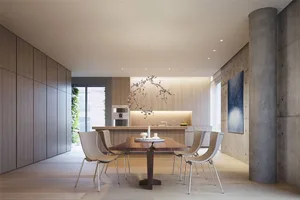 Contemporary residential kitchen featuring wooden dining table and chairs with minimalistic design.
