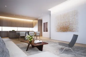 A modern residential living room featuring minimalist design, wooden furniture, leather accents, metal chairs, and canvas wal