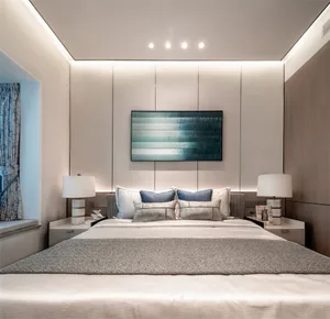 A modern minimalist bedroom featuring a large bed with neutral-colored bedding, light wood headboard, and blue abstract paint