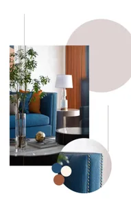 Modern living room featuring a blue upholstered sofa, side table, green plant, and coffee table.