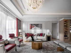 A modern living room with clean lines, white walls, red accents, and a combination of textures and materials.