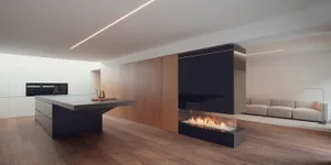 Modern residential kitchen featuring concrete flooring and sleek, minimalist design elements.