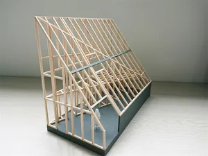 A 3D architectural model of a wooden frame structure on a grey base.