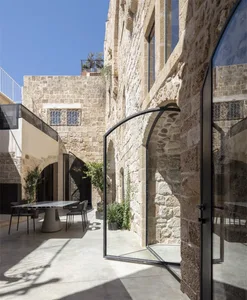 A modern rooftop designed with concrete and stone materials.