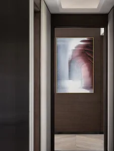 A modern door with an abstract painting frame in a minimalist style.