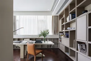 A modern, minimalist home office with a marble desk, wooden floor, and bookshelf.