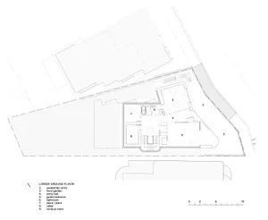 A 2D architectural drawing of a house's ground floor plan, showing the layout of rooms and spaces.