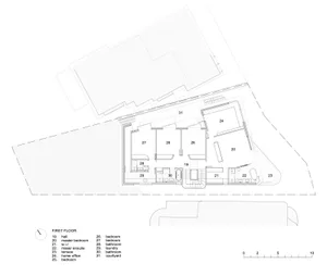 Floor plan of a modern residential building, showing the layout and design of various rooms.