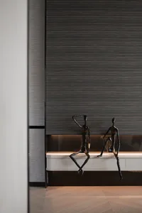 Modern studio interior with metallic furniture and minimalist design elements.