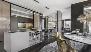 Modern, minimalist residential kitchen with black and white flooring.