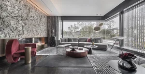 Modern living room featuring metallic, glass, and marble design elements