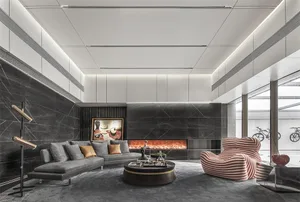 A modern minimalist living room with marble walls and a comfortable seating area.