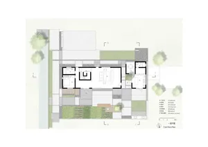 Modern house with concrete floors and wooden furniture in a floor plan layout.