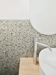 Modern bathroom featuring a terrazzo countertop design