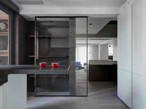 A modern interior space with concrete finishes and minimalist design.