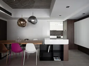 Contemporary kitchen featuring wood, glass, and marble materials.