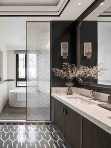 Modern bathroom with glass tiles and wooden vanity