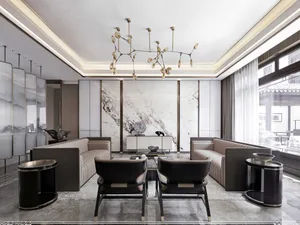 Modern living room with marble accent wall, plush seating, and minimalist decor.