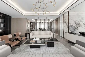 Modern living room featuring marble, leather, and glass materials