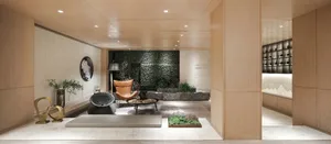 Modern living room featuring wooden furniture, a green wall, and a plant.