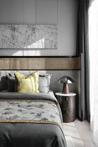 Modern bedroom featuring textured wood headboard and rattan accents