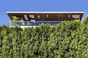 Modern residential home featuring a contemporary exterior with wooden elements.