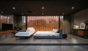 Modern bedroom featuring a wooden paneled bed and white bedding.