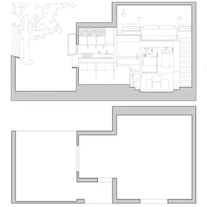簡約客廳布局，融合多種材質，包括淺色木地板、深色木質家具以及玻璃元素