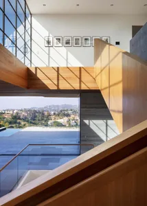 Modern interior design featuring wooden elements and open spaces.