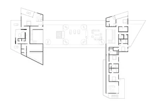 Floor plan of a modern office with open-plan spaces.