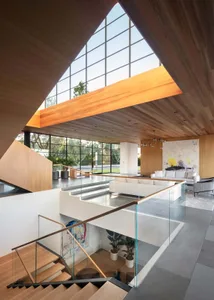 Modern minimalist interior featuring wood and glass elements