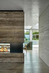 Modern living room extension featuring stone and concrete materials