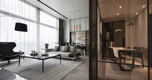Modern living room with minimalist furniture, white sofas, and a contemporary design aesthetic.